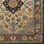 A beautifully detailed hand-tufted wool rug showcasing an intricate floral design with rich colors, perfect for large living rooms or dining rooms. This area rug features a blend of traditional and modern aesthetics, making it an ideal centerpiece for any space seeking elegance and warmth.