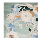 Beautiful abstract bloom flow hand-tufted area rug featuring pastel floral designs. This wool rug is perfect for large living room spaces, adding a touch of elegance to any home decor.