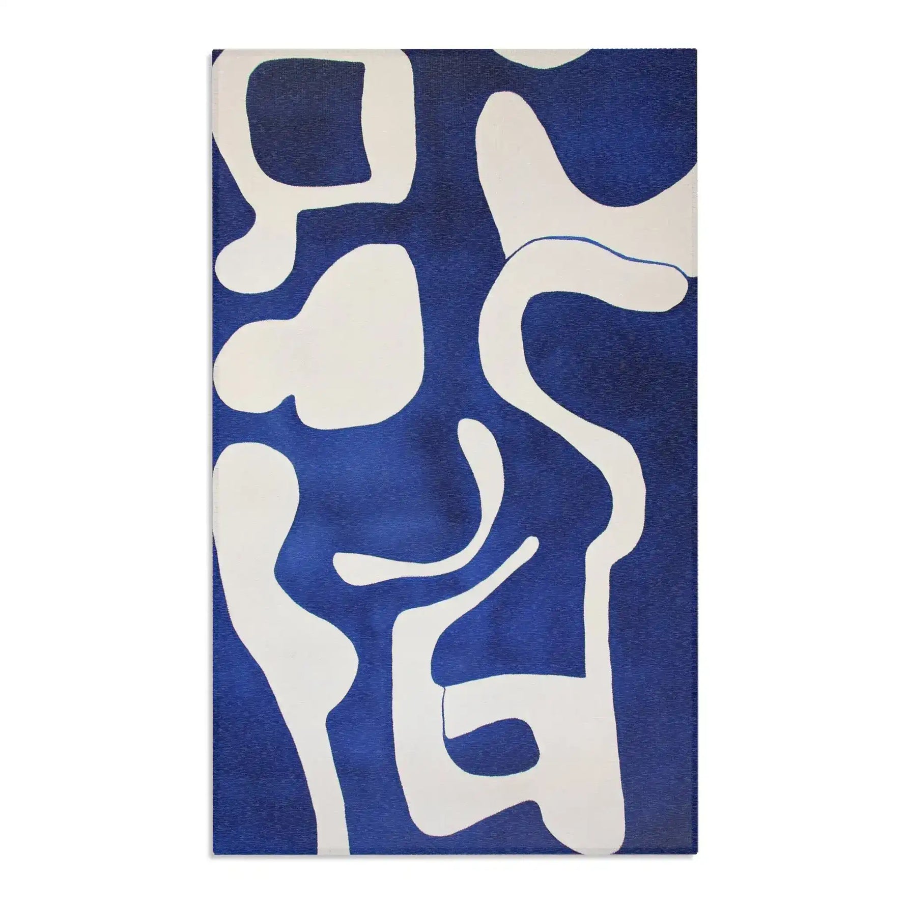 Abstract Blue and White Geometric Rug flat lay angled view, cobalt blue and cream white flowing organic forms on white background
