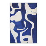Abstract Blue and White Geometric Rug flat lay with visible stitched hem edges, cobalt blue and white organic abstract pattern