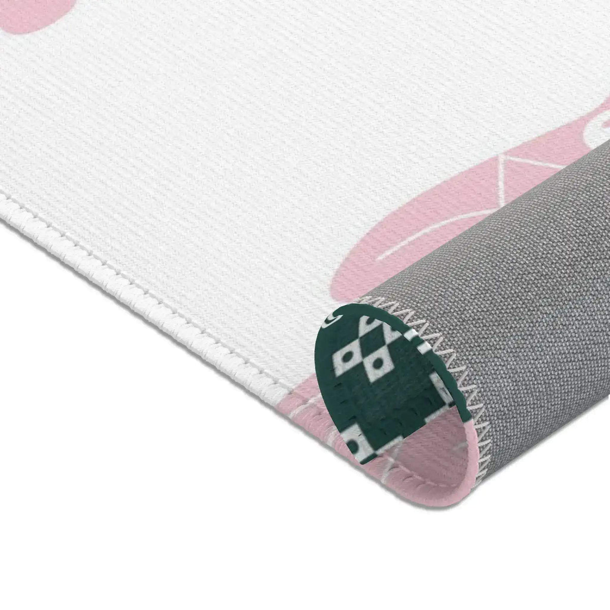 Corner detail of an abstract cloud and floral pattern accent rug, showcasing the intricate design and texture of the indoor area rug.