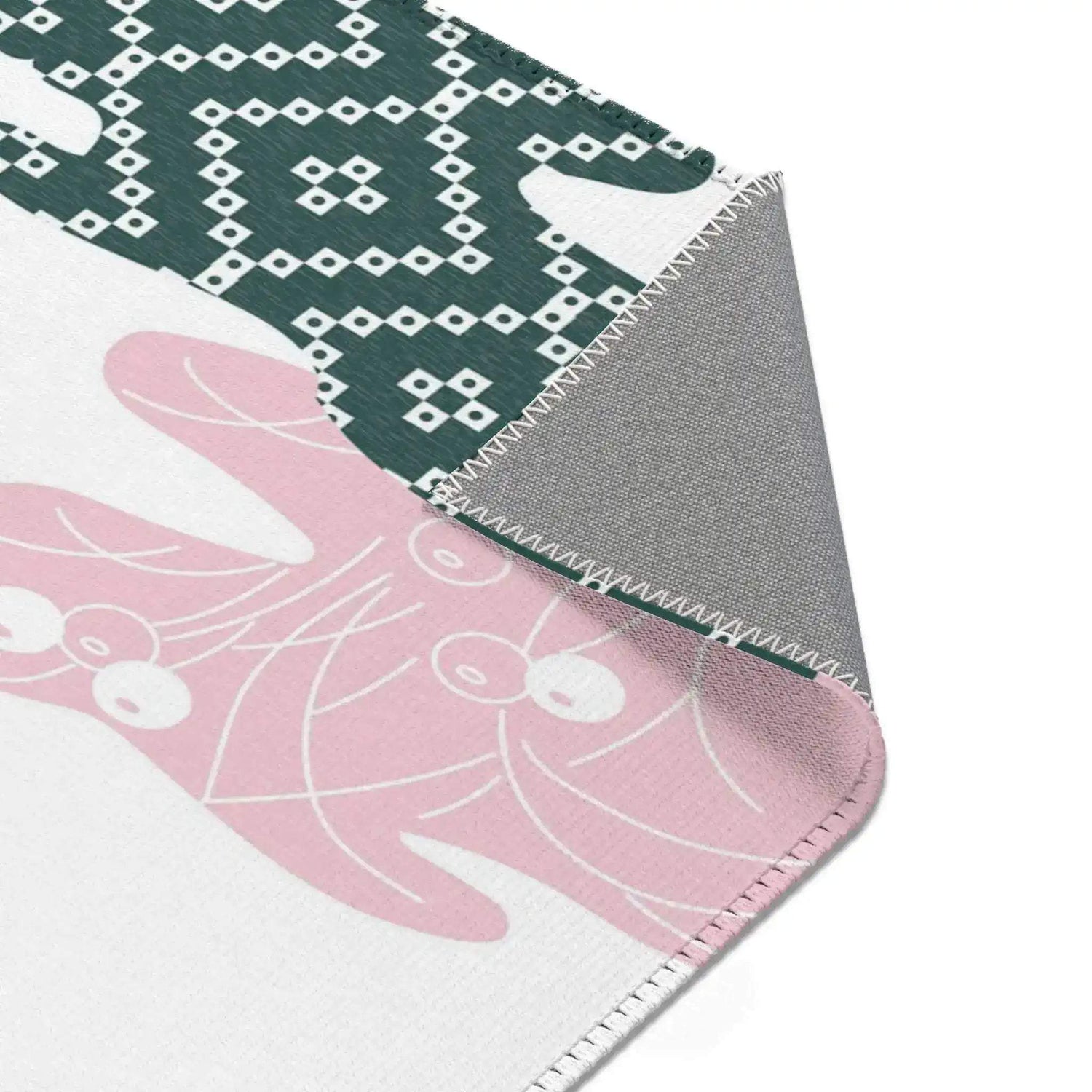 Close-up of an abstract cloud and floral pattern area rug, showcasing intricate designs and corner detail, perfect as an indoor accent rug.