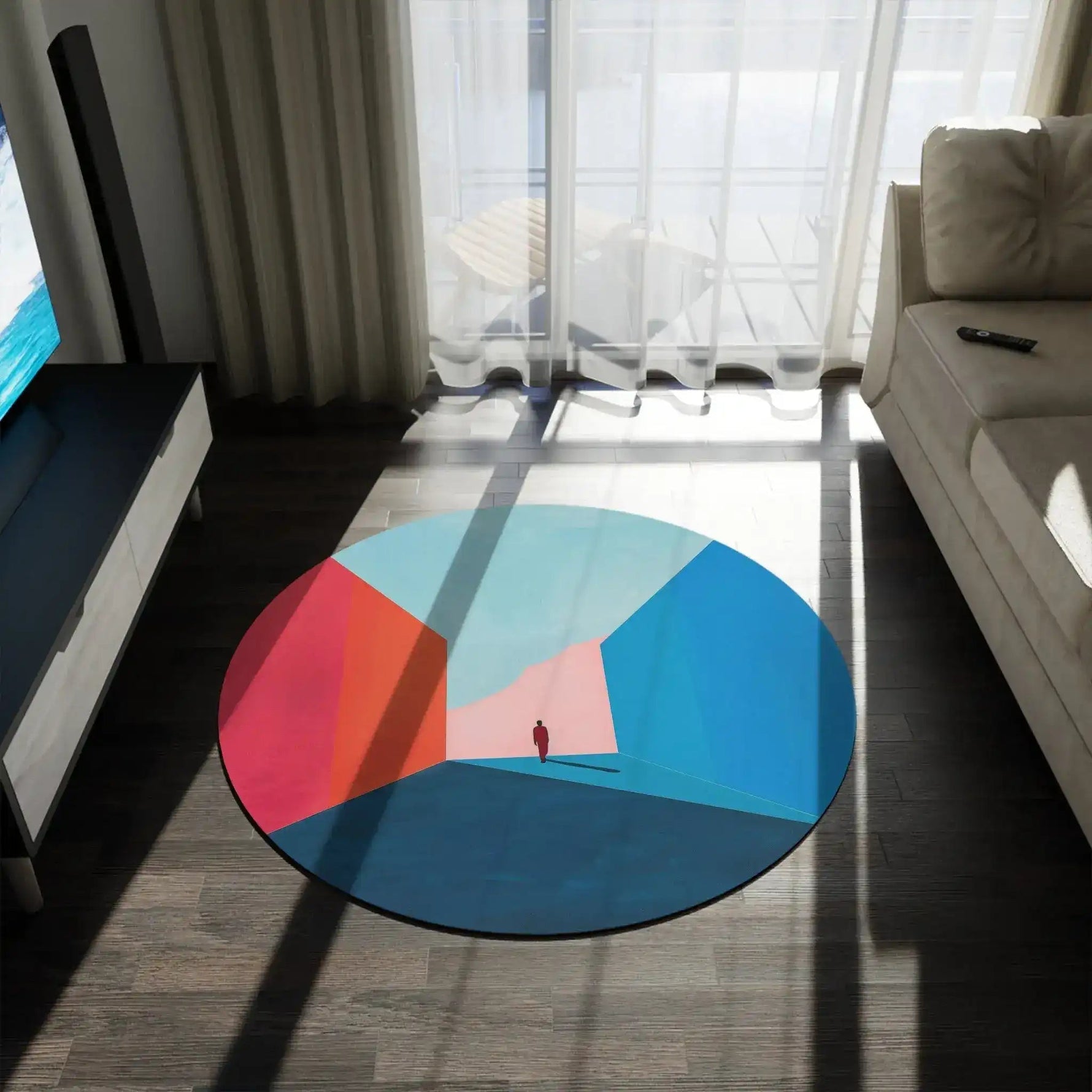 round abstract color-block rug on dark hardwood floor with light and shadow