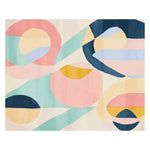 Vibrant abstract design of a hand-tufted wool area rug, perfect for adding contemporary flair to your living room. The rug features colorful geometric patterns in pastel shades, making it a standout piece among area rugs for living room decor.