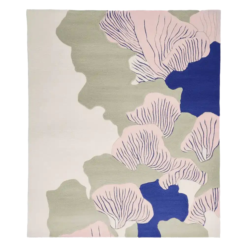 A beautiful Abstract Coastal Bloom hand-tufted area rug featuring a modern design with soft pastel colors and bold blue accents. This contemporary wool rug, perfect for any living room, measures 8x10, adding a touch of elegance and style to your space.