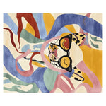 Top view of an Abstract Dog Mood Hand Tufted Area Rug featuring vibrant colors like blue, yellow, and red with an artistic dog face design.