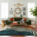 Abstract ember tufted wool rug in green-sofa living room with teal ground, cream-black spiral and rust-orange accent