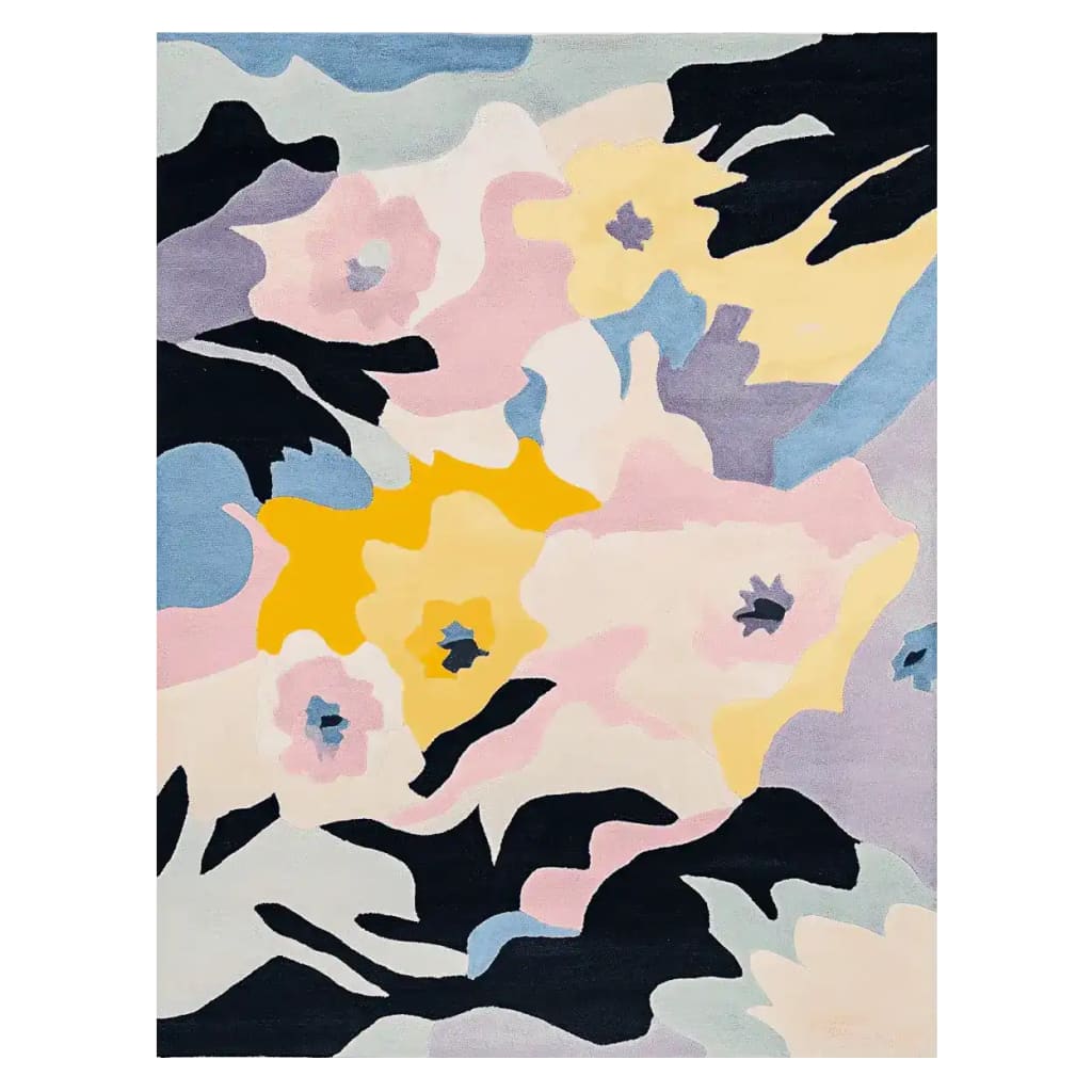 Vibrantly colored Abstract Floral Rhythm hand-tufted area rug featuring a contemporary design with bold floral patterns in pink, yellow, blue, and black. This wool rug is perfect for adding a modern touch to any living room.