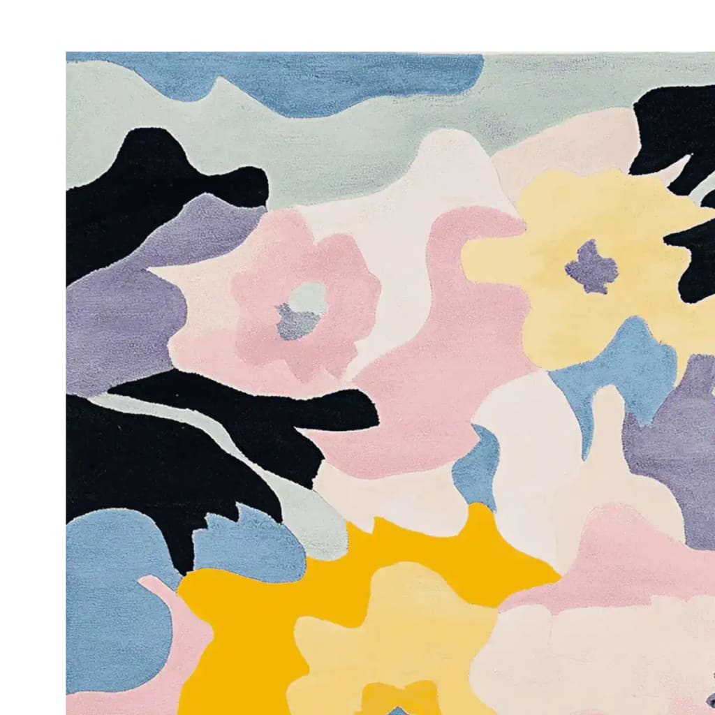 Close-up view of an Abstract Floral Rhythm Hand Tufted Area Rug showcasing a vibrant mix of pastel colors in a floral pattern. Ideal for adding a touch of modern elegance to any living room, this contemporary wool rug blends soft pinks, blues, and yellows.