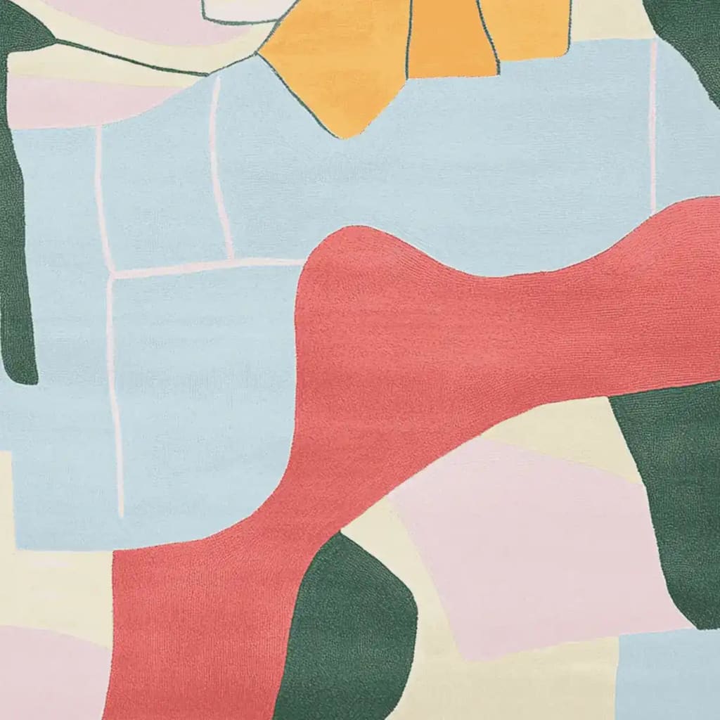 A vibrant Abstract Garden Hand Tufted Rug featuring bold geometric shapes and colors, perfect for adding a contemporary touch to any living room. This wool area rug brings together shades of pink, blue, green, and yellow, making it an ideal choice for those seeking stylish area rugs for their living room.