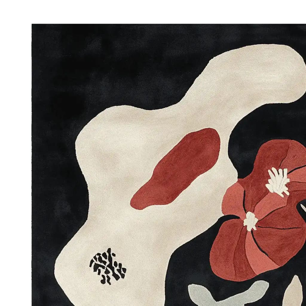 Top view of an Abstract in Bloom Hand Tufted Area Rug, featuring an artistic design with floral and organic patterns in red, black, and cream. This contemporary wool rug is perfect for adding a touch of elegance to any living room.
