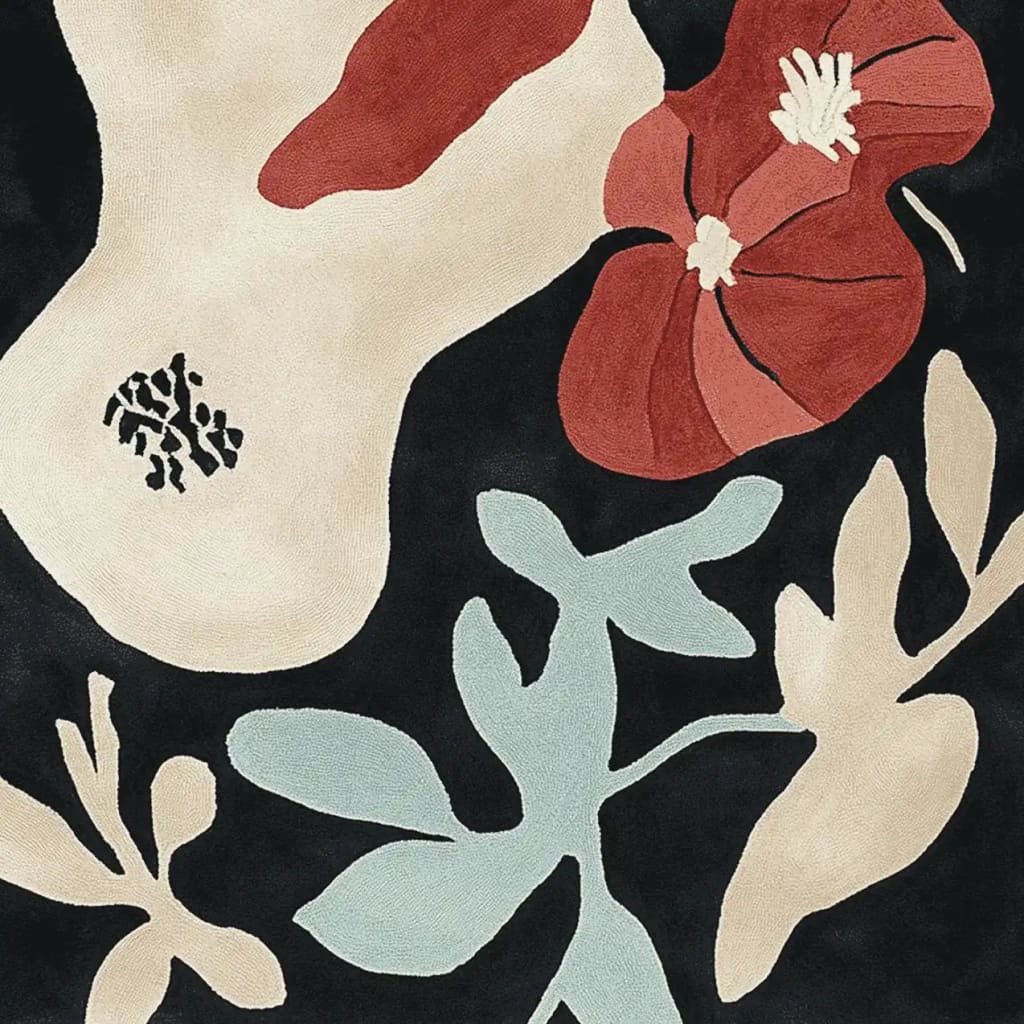 A vibrant hand-tufted area rug featuring an abstract design with bold floral patterns in red, cream, and light blue against a dark background. Perfect for adding a contemporary touch to your living room, this wool rug combines artistry and comfort.
