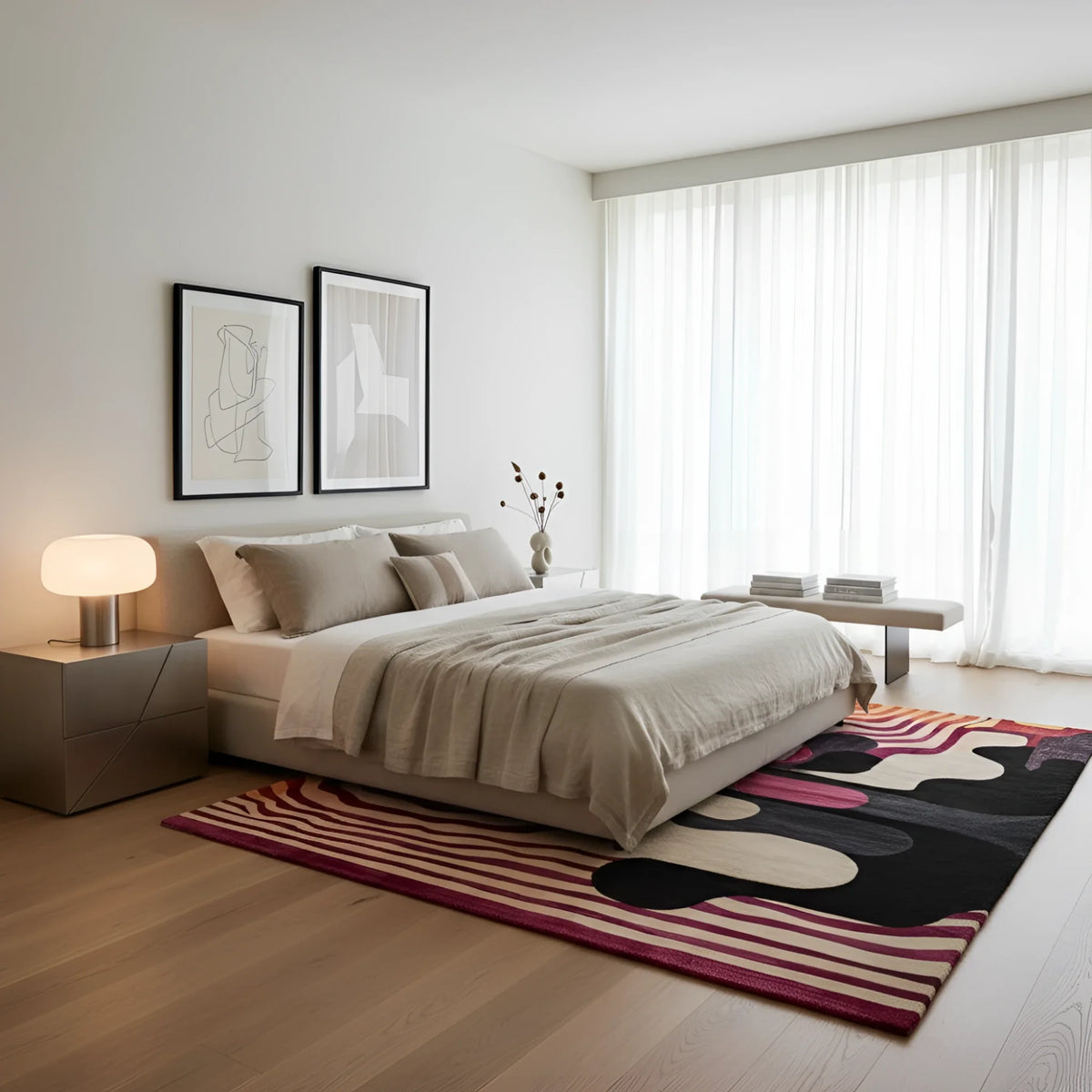 Modern bedroom with a bed, nightstands, and abstract rug.
