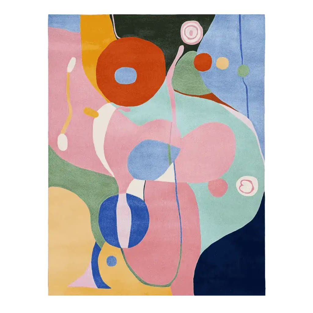 A vibrant abstract meadow dance hand-tufted area rug featuring bold and colorful shapes in shades of pink, orange, blue, and green. This contemporary rug, made from high-quality wool, is perfect for adding a splash of color to your living room.