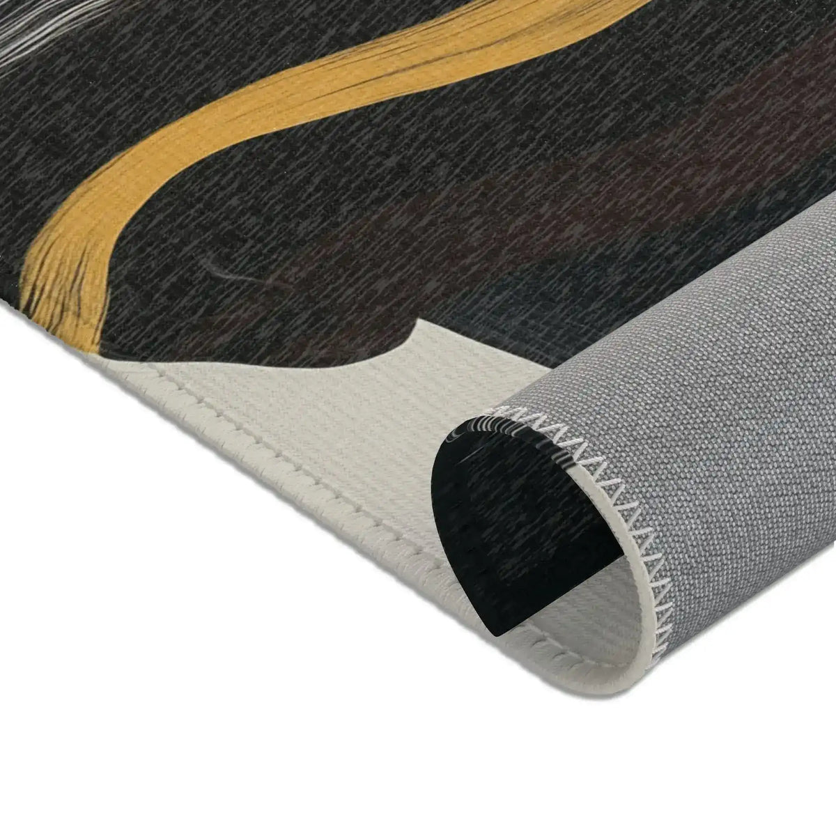 Abstract Noir Striped Elegance Rug corner close-up — gold stripe crossing dark pile, corner rolled to show cream face and grey backing