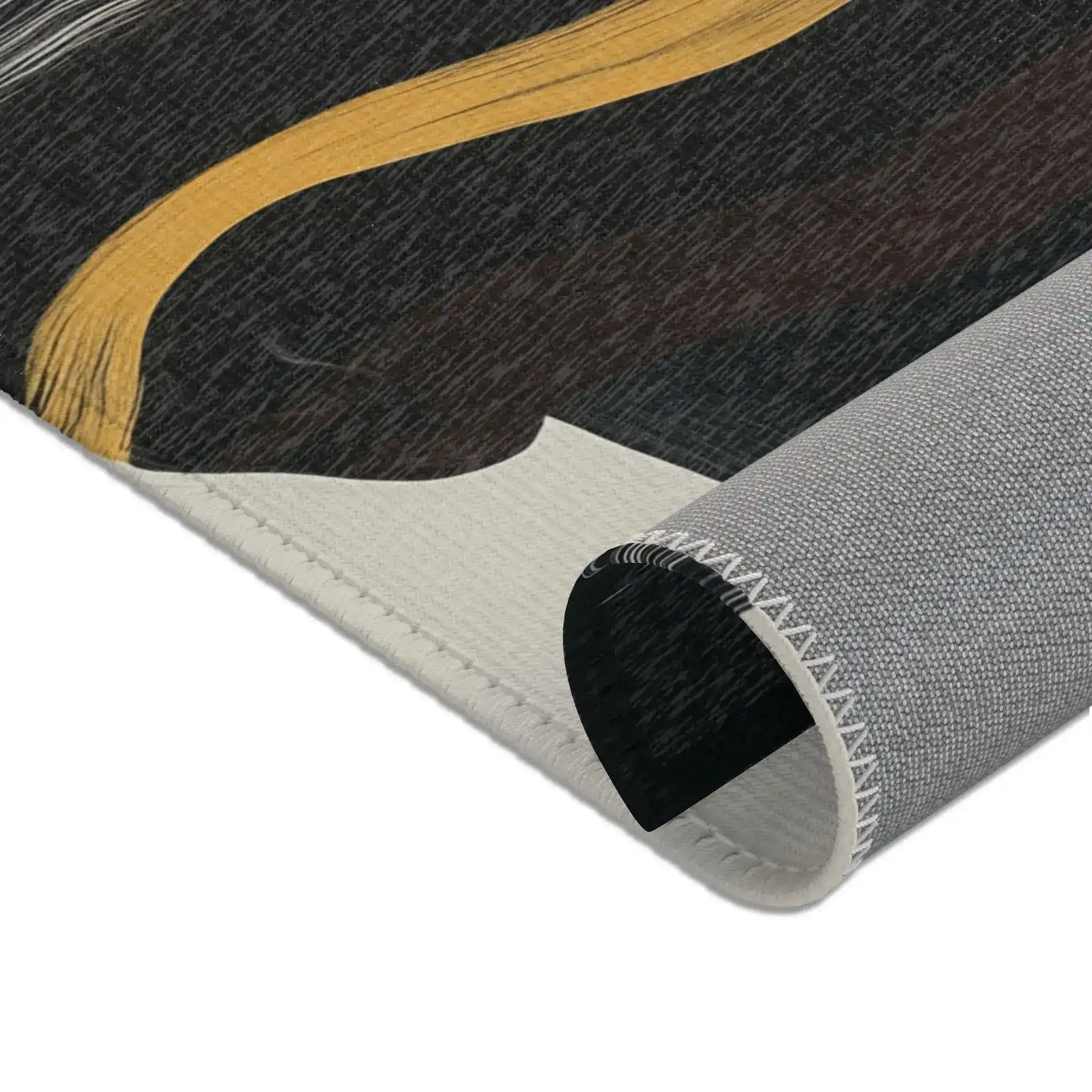 Abstract Noir Striped Elegance Rug corner close-up — gold stripe crossing dark pile, corner rolled to show cream face and grey backing