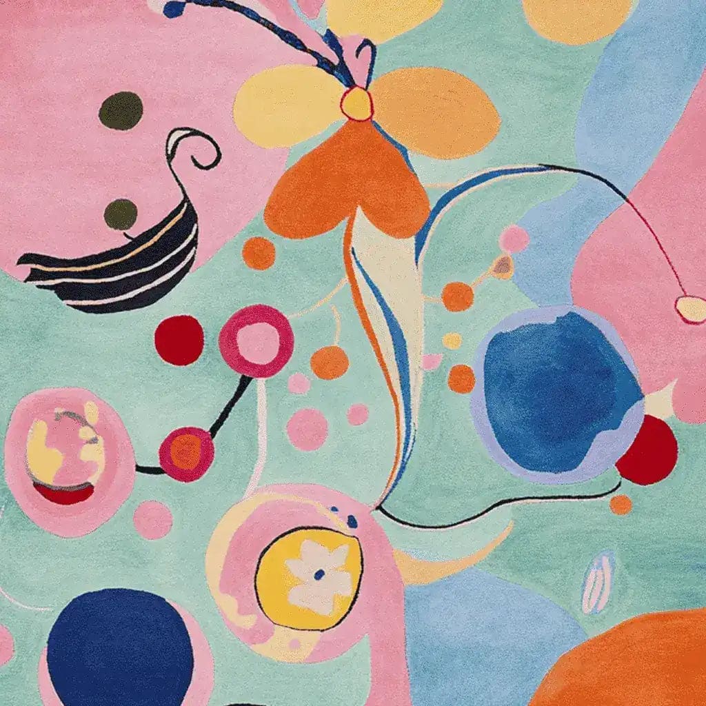 Vibrant and colorful Abstract Shape Mirage Hand Tufted Rug, showcasing an artistic design with swirls of pink, blue, orange, and yellow. This contemporary wool rug is perfect for adding a splash of color to any living room, making it an ideal choice for those seeking large living room rugs with a modern flair.