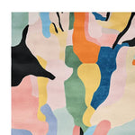 A vibrant, abstract area rug featuring a flowing terrain design. This contemporary wool rug showcases a mix of bold colors including black, orange, pink, blue, and green, making it a perfect centerpiece for large living room rugs.