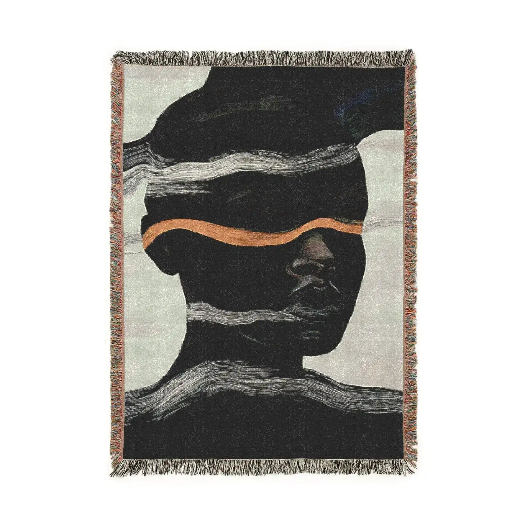 Fringed woven throw blanket with dark silhouetted abstract face, horizontal white wave bands and copper stripe, off-white ground, portrait