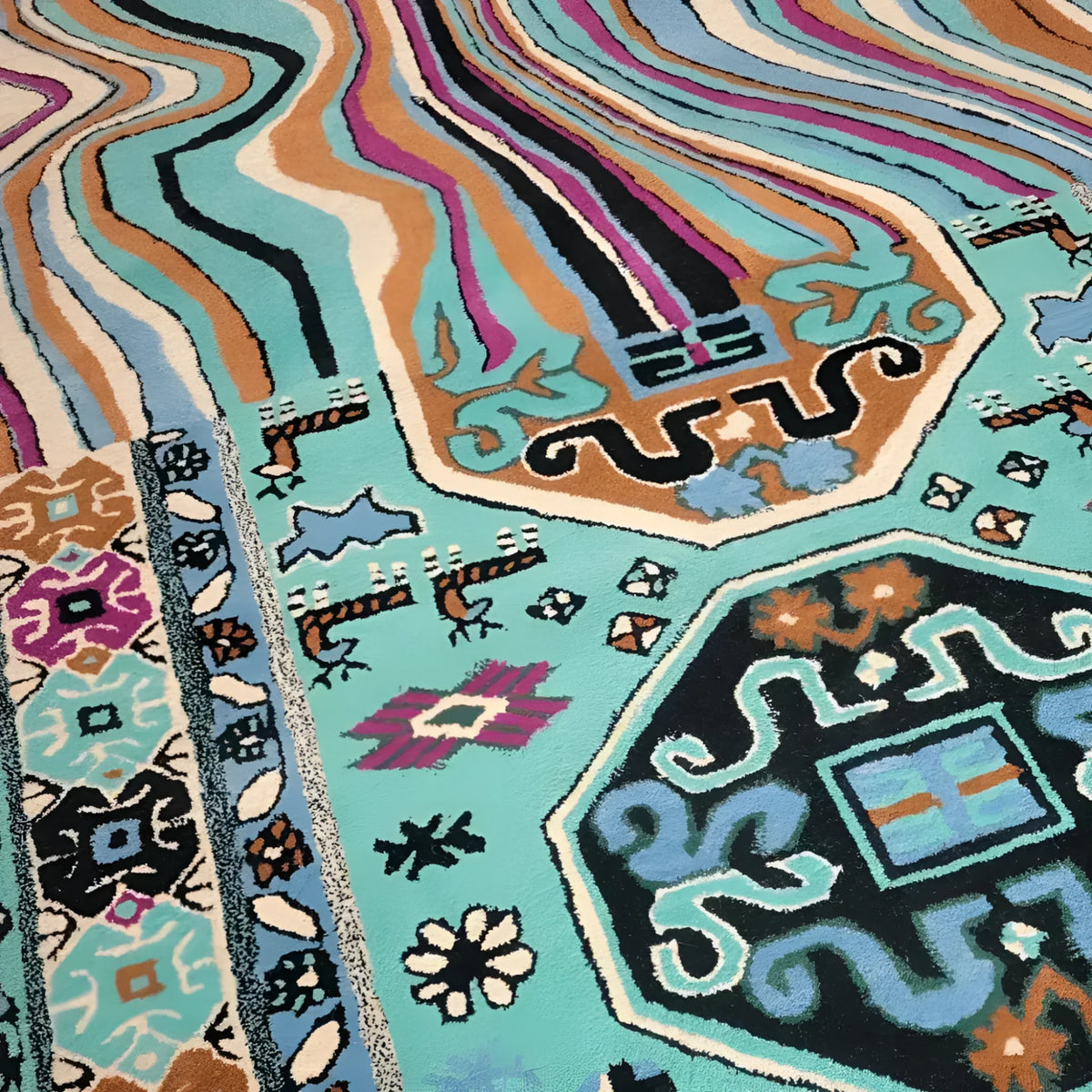 A close-up view of the Alaia Persian Turquoise Melting Area Rug, showcasing its vibrant abstract design with swirling patterns in turquoise, purple, and brown. This large area rug is perfect for adding a touch of elegance to any living room or office space, crafted from high-quality wool for a soft and durable finish.
