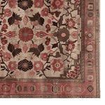 Top view of the Arcadian Grandeur Knotted Wool Rug showcasing a rich floral pattern with intricate designs in warm tones, perfect for adding elegance to any space.