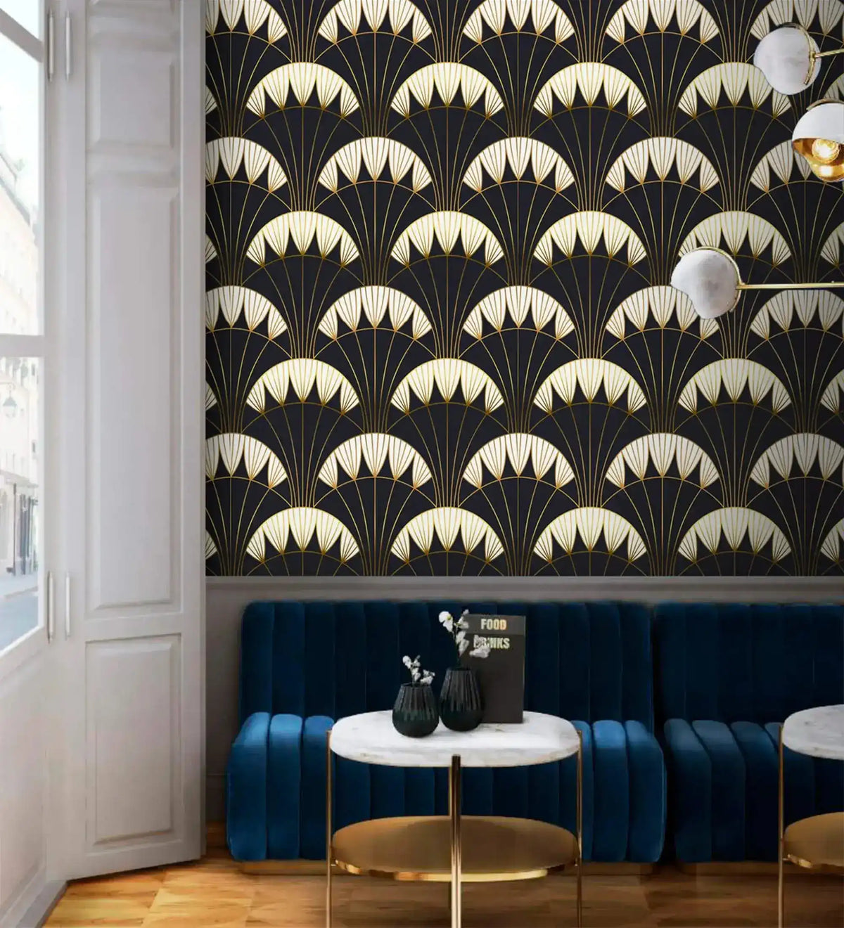 Art Deco black gold wallpaper above blue ribbed velvet banquette, marble-top gold tables, globe sconce, parquet floor