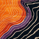 A vibrant Art Deco area rug featuring bold orange, purple, and black abstract patterns, perfect for contemporary living room spaces. This wool rug showcases a unique hand-tufted design, ideal for those seeking stylish area rugs for living rooms.
