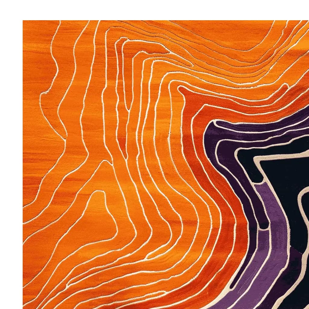 Vibrant Art Deco Current Hand Tufted Area Rug featuring bold orange, red, and purple abstract patterns. Perfect for adding a contemporary touch to living room area rugs, this wool rug combines style and comfort, ideal for modern homes seeking unique area rugs for living rooms.
