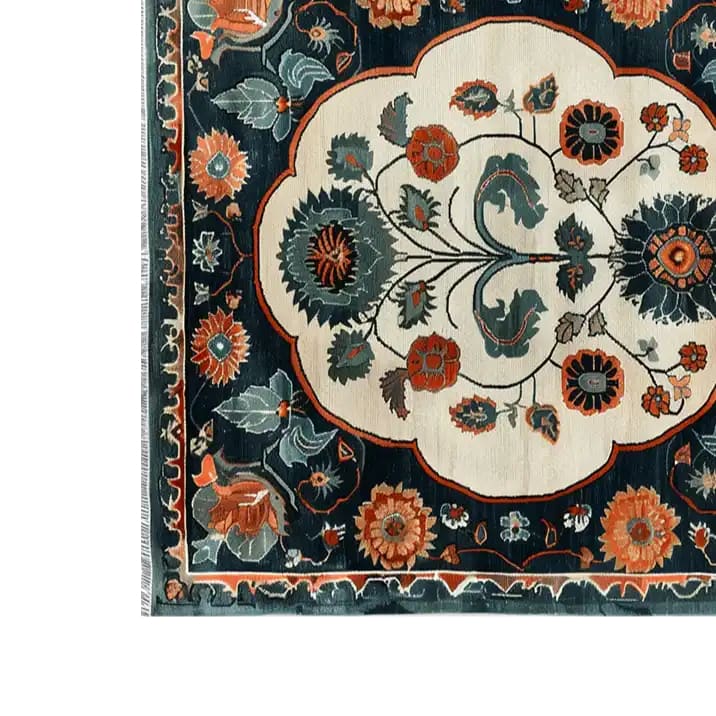A close-up view of the Artesian Splendor Knotted Wool Rug, featuring intricate floral patterns in vibrant orange, teal, and cream colors. This elegant area rug is perfect for adding a touch of luxury to living room area rugs, crafted from high-quality wool for a soft and durable finish.