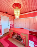 A vibrant Aztec Red Hand Tufted Wool Rug beautifully complements a stylish bedroom setting. The large area rug features bold geometric patterns, adding a touch of elegance to the room. Perfect as a bedroom area rug, it effortlessly enhances the decor with its rich colors and soft texture.