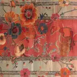Experience the vibrant elegance of the Autumn's Embrace Knotted Wool Rug, featuring a stunning floral pattern in rich autumn colors. This area rug showcases an intricate design with shades of red, orange, and blue, perfect for adding a touch of warmth and sophistication to any room.