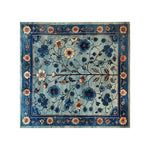 Beautiful Azure Eternal Knotted Wool Area Rug with intricate floral patterns in rich blue tones, featuring vibrant blossoms and delicate vines, perfect for adding elegance to any room.