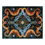 Vibrant Baroque Brilliance Hand Tufted Wool Area Rug featuring ornate patterns with rich colors including orange, blue, and black, viewed from the top.