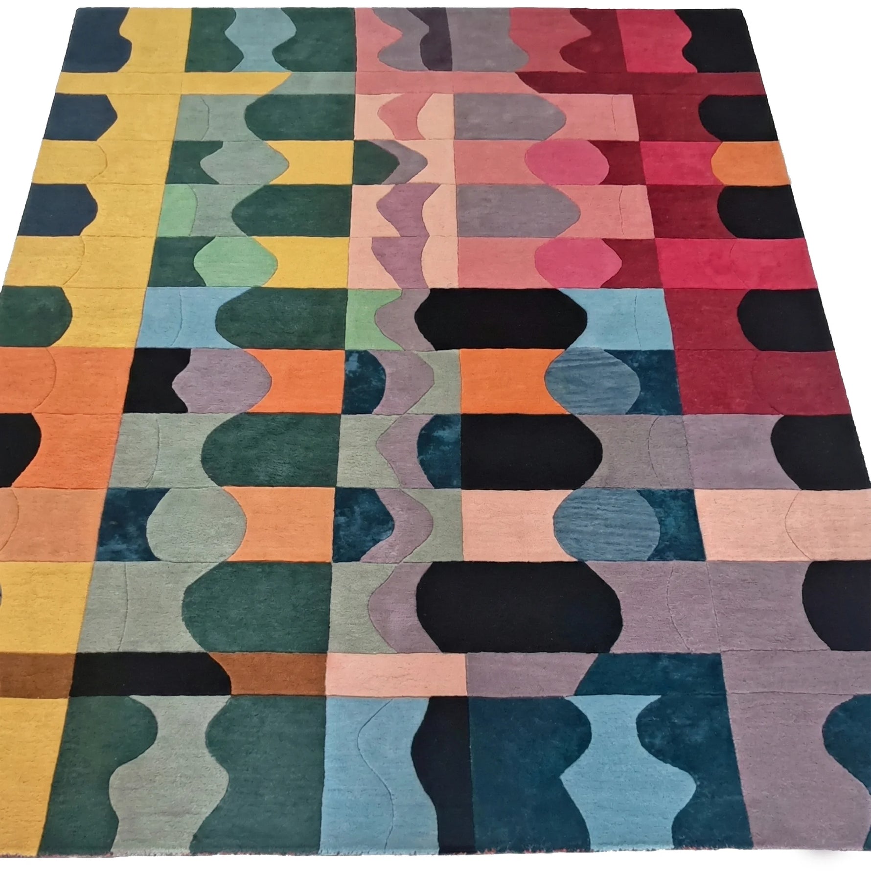 Multicolored geometric patterned rug on a white background