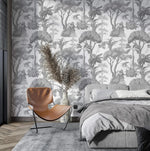 Bedroom feature wall in Grey Forest Serenity Wallpaper with tan chair and grey bed