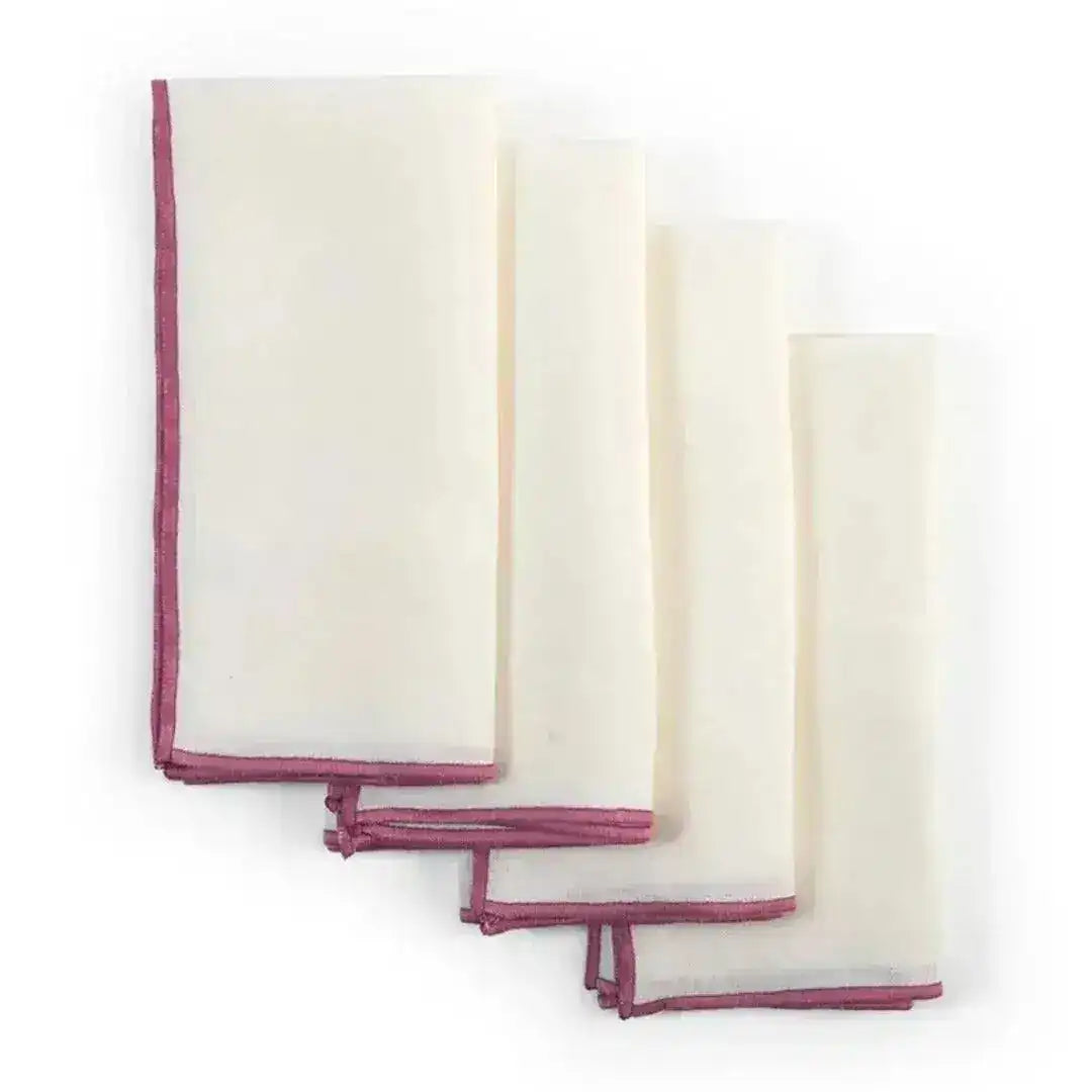 Four ivory rectangular berry border beauty placemats fanned in a stack, thin dusty-rose embroidered border edge