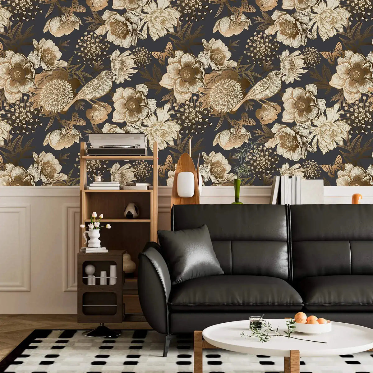 Bird garden wallpaper in living room, sepia peonies and songbirds on navy above black leather sofa