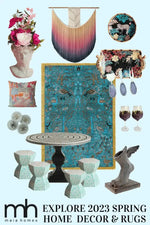 A beautifully curated collection of home decor items featuring the Birds of Paradise Traditional Hand Tufted Wool Rug in blue. This elegant area rug is perfect for living rooms or offices, adding a touch of sophistication with its intricate design. The composition also includes a variety of decorative pieces like a floral vase, wall hanging, and stylish tableware, creating a harmonious and inviting space.