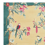 Birdsong Reverie Hand Tufted Area Rug featuring elegant birds perched on branches with vibrant pink flowers, set against a soft cream background. Perfect for large living room spaces, this wool rug adds a touch of nature-inspired charm to any decor.