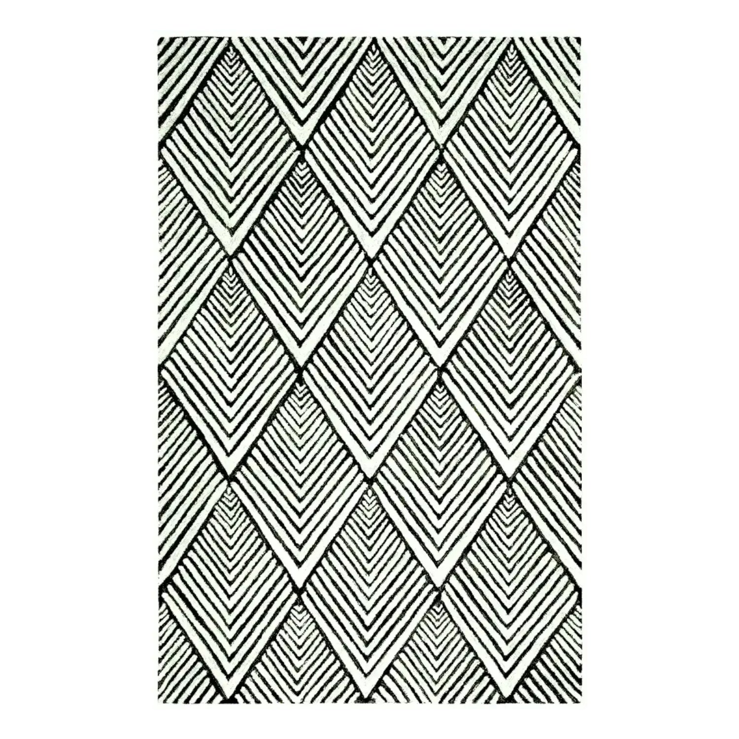 Top view of a Black and Cream Art Deco Geometric Hand Tufted Wool Rug showcasing an intricate diamond pattern. This stylish area rug is perfect for adding a touch of elegance to bedrooms and living rooms. Ideal as a wool rug for any modern home decor.