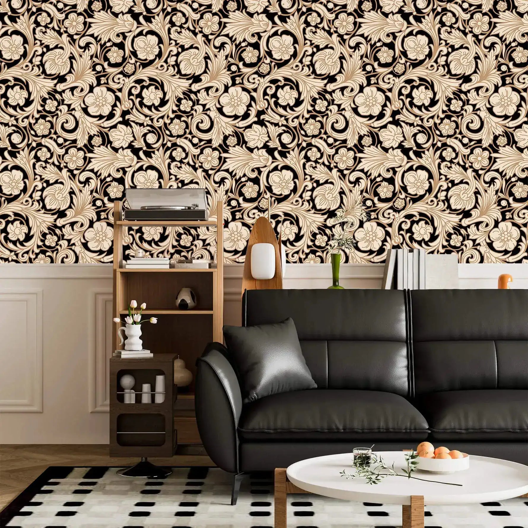 Black and gold damask floral wallpaper above white panelling with black leather sofa and shelf