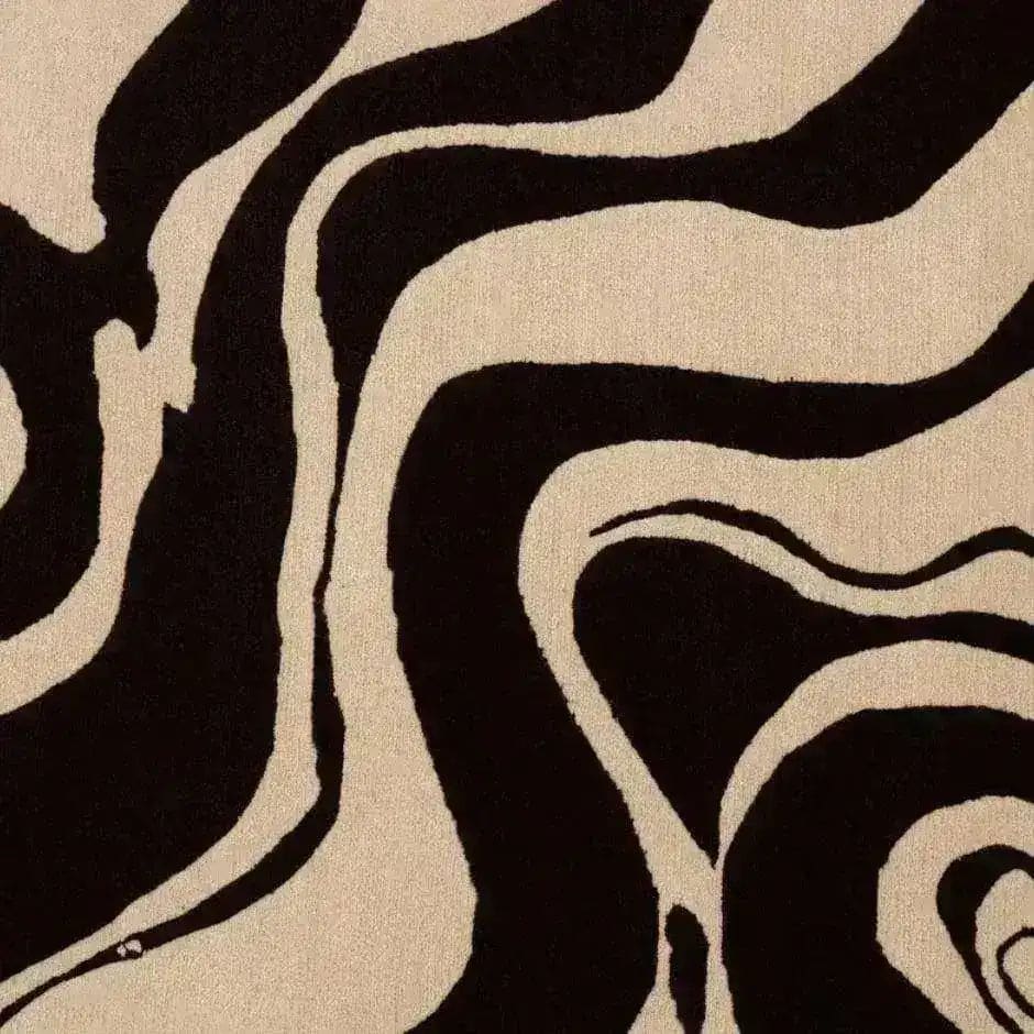 Top view of a Black and Tan Melting Hand Tufted Wool Area Rug featuring abstract patterns. Ideal for dining rooms, this vintage rug adds a touch of elegance under any dining table, creating a cozy and stylish space. Perfect as a large area rug or dining room carpet, crafted from high-quality wool.