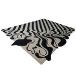 Black and Tan Melting Hand Tufted Wool Rug featuring an abstract design with flowing black patterns on a tan background, perfect as a large area rug for a dining room or under a dining table, adding a touch of vintage elegance to dining room carpets.