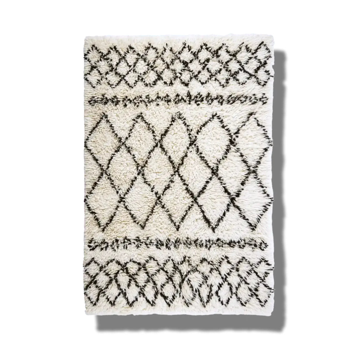 Top view of a Black and White Diamonds Shaggy Wool Area Rug, perfect as a runner rug for hallways or kitchens. This wool rug features an intricate diamond pattern, making it a stylish addition to any bathroom or kitchen setting.