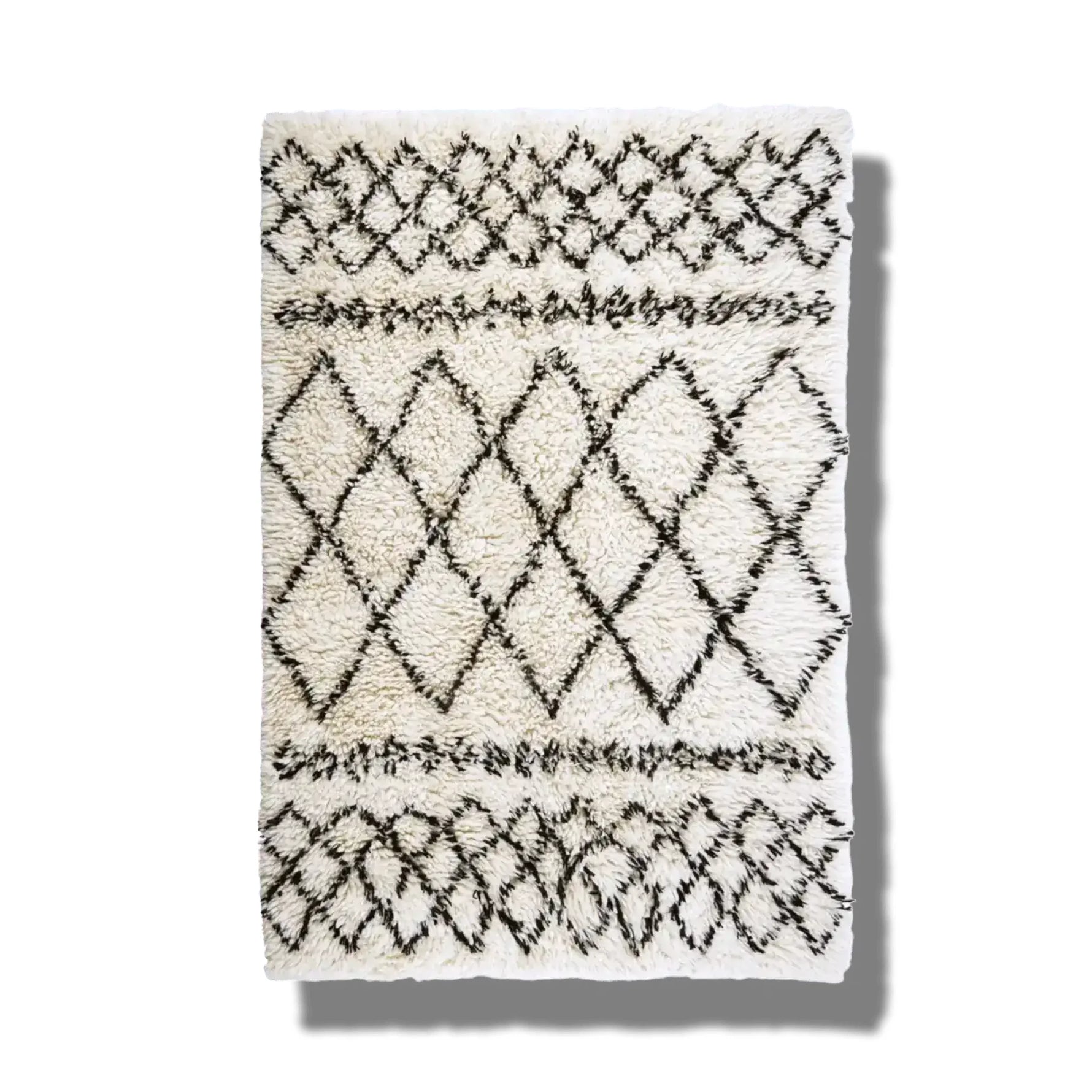 Top view of a Black and White Diamonds Shaggy Wool Area Rug, perfect as a runner rug for hallways or kitchens. This wool rug features an intricate diamond pattern, making it a stylish addition to any bathroom or kitchen setting.