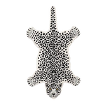 Stylish black and white hand-tufted leopard-shaped wool rug, perfect for adding a bold statement to your dining room or living room. This unique area rug enhances any living room space with its striking design, making it a must-have among rugs for living room decor.