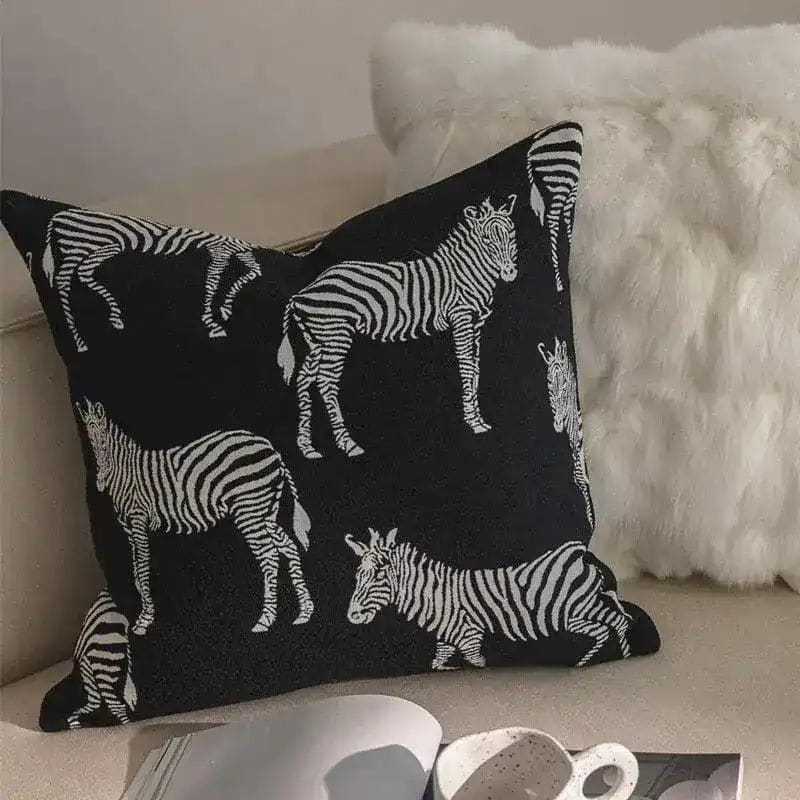 Black and white zebra throw pillow cover with fringes, perfect for adding a stylish touch to your living space.