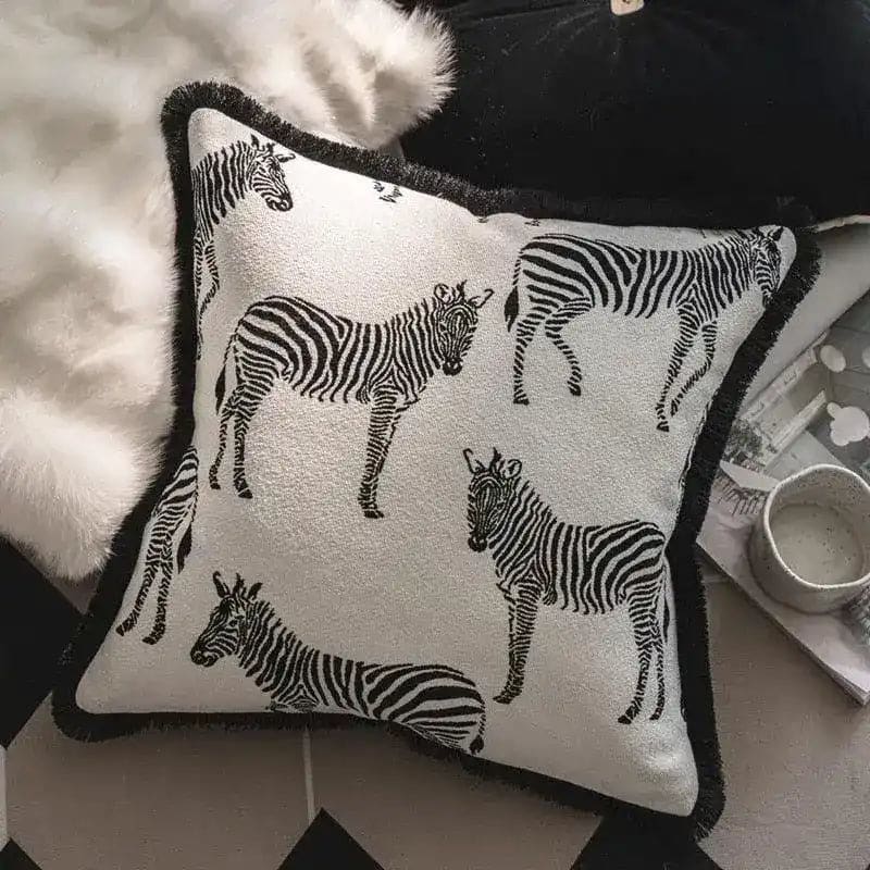 Black and white zebra throw pillow cover with fringes, featuring a stylish zebra print design.