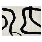 A contemporary area rug featuring bold black abstract lines on a soft cream background, perfect for large living rooms. This hand-tufted wool rug adds a stylish touch to any modern space, making it an ideal choice for those seeking elegant living room area rugs.