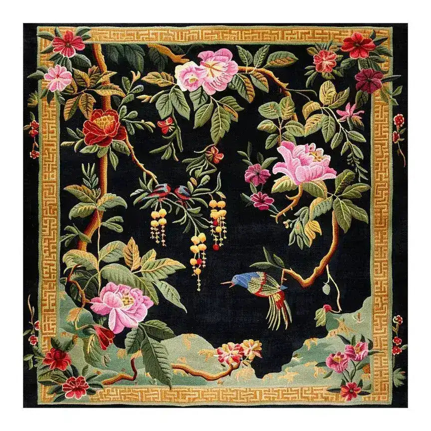 Luxurious Black Floral Symphony hand-tufted area rug, perfect for adding elegance to your living room. The 8x10 wool rug features vibrant pink and red flowers with lush green leaves on a dark background, ideal for those seeking large living room rugs with a touch of nature.